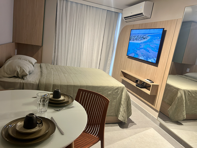 Estúdio com vista mar e piscina no rooftop